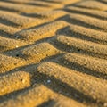 Golden sand with a rippled texture, creating a pattern of parallel ridges Royalty Free Stock Photo