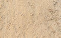 Golden sand summer background. Sand pattern texture of a beach Royalty Free Stock Photo