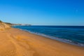 Golden sandy beach in the Algarve, Portugal Royalty Free Stock Photo