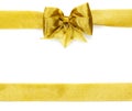 Golden satin gift bow. Ribbon Royalty Free Stock Photo