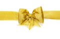 Golden satin gift bow. Ribbon Royalty Free Stock Photo