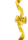 Golden satin gift bow. Ribbon Royalty Free Stock Photo