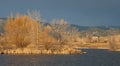 Golden Scene with Distant Silos and Storm Clouds