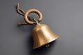 Golden school bell on grey background. Generate Ai