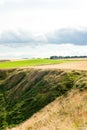 Golden scottish wheat fields and ravines in Dunnottar. Panoramic Royalty Free Stock Photo