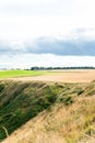 Golden scottish wheat fields and ravines in Dunnottar. Panoramic Royalty Free Stock Photo