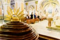 Golden sculpture of a lamb inside a Catholic church, riches and gold inside Royalty Free Stock Photo