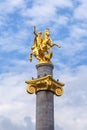 Golden sculpture of Saint George on the Freedom Square in Tbilisi