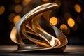 a golden sculpture of a wave on a table