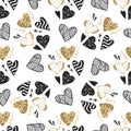 Golden seamless pattern with the image of tribal hearts
