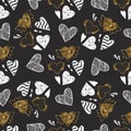 Golden seamless pattern with the image of tribal hearts