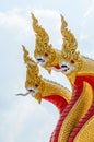 Golden serpent sculpture in the traditional Thai style