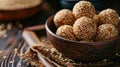 Golden sesame balls, crunchy exterior, glistening with sesame seeds, revealing soft, chewy centers