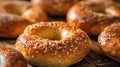 Golden Sesame Seeded Bagels On Hardwood Surface