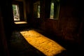 Golden shadow trough temple window at Tom ridder temple in siem reap, Cambodia Royalty Free Stock Photo