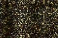 Golden shimmery background with shiny gold sequins. Shiny glitter screen.