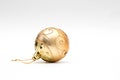 Golden shine Christmas ball isolated on white background Royalty Free Stock Photo