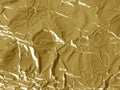 Golden shine crumpled foil texture Royalty Free Stock Photo