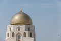 Golden shine minarets of mosque against the blue sky Royalty Free Stock Photo