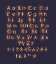 Golden shining alphabet, light effect letters Royalty Free Stock Photo