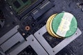 Golden bitcoins with flag of nigeria on a computer electronic circuit board. bitcoin mining concept