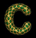 Golden shining metallic 3D with green glass symbol capital letter C - uppercase isolated on black.