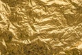 Golden shiny metallic gold crumpled texture for background