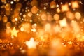 Golden shiny stars on defocused background with bokeh