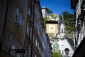 Golden shop sign in the Getreidegasse in Salzburg Royalty Free Stock Photo