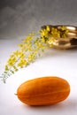 Golden shower flower and yellow cucumber Royalty Free Stock Photo