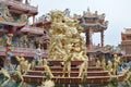 Golden shrine Nezha statue Chinese angel in Buddhist temple