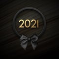 Golden 2021 sign in black wreath