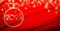 Golden 2023 sign in christmas bauble on red background