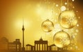 Golden silhouette background of Berlin buildings against Christmas tree toys with snow flakes Royalty Free Stock Photo