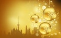 Golden silhouette background of Shanghai buildings against Christmas tree toys with snow flakes Royalty Free Stock Photo