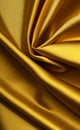 Close up silk fabric yellow, luxury themed abstract background. Silk fabric golden, satin fabric wave background. Royalty Free Stock Photo