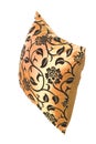 Golden silk pillow with black ornaments Royalty Free Stock Photo