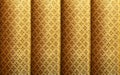 Golden silk with vintage royal pattern background. Luxury weave texture made from thai silk