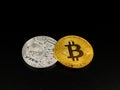 Golden and silver bitcoin on black background. Bitcoin cryptocurrency.