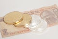 Golden and silver bitcoin coins on Indian Ten Rupee