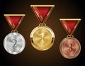 Golden silver and bronze blank medals hanging on red ribbons vector illustration Royalty Free Stock Photo