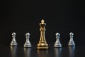 Golden and silver chess piece on dark background with strategy or planning concept. King of chess and business ideas. 3D rendering