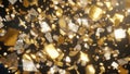 Golden and silver confetti pieces exploding and falling against a dark background with bright light flares Keywords: confetti, Royalty Free Stock Photo
