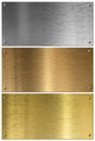 Golden, silver and copper metal plates set Royalty Free Stock Photo