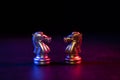 Golden and silver horse chess pieces Invite face to face and There are chess pieces in the background. Concept of competing, Royalty Free Stock Photo