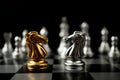 Golden and silver horse chess pieces Invite face to face and There are silver chess pieces in the background. Concept of competing Royalty Free Stock Photo