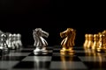 Golden and silver horse chess pieces Invite face to face and There are chess pieces in the background. Concept of competing, Royalty Free Stock Photo