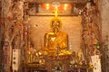 Golden sitting Buddha .