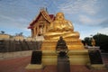 Golden Sitting Buddha Statue Katyayana at Wat Pa Phu Hai Long