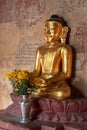 Golden sitting Buddha statue in Sulamani temple in Bagan Burma Myanmar